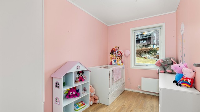 Sjarmerende barnerom med fin plass for de minste