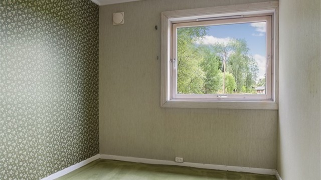 Ett av to soverom i boligens 2. etasje.