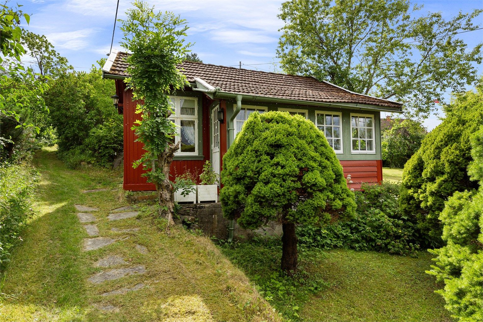 Annekset er et frittstående bygg på eiendommen, også oppført rundt 1910.