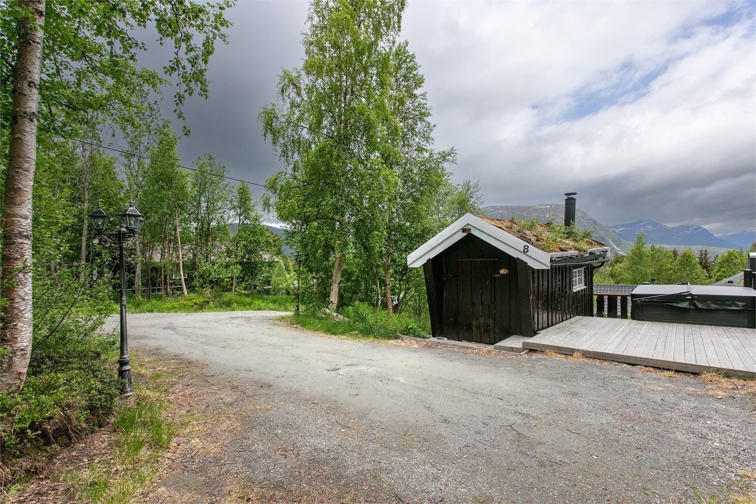 God plass til parkering på egen tomt.