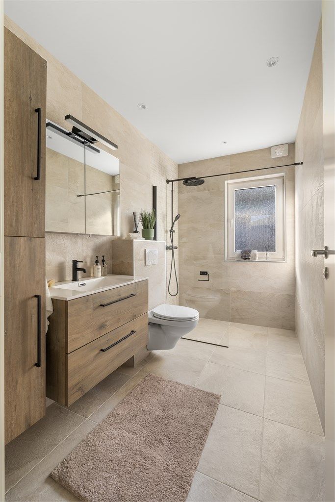 Badet holder en gjennomgående høy standard med delikate materialvalg.