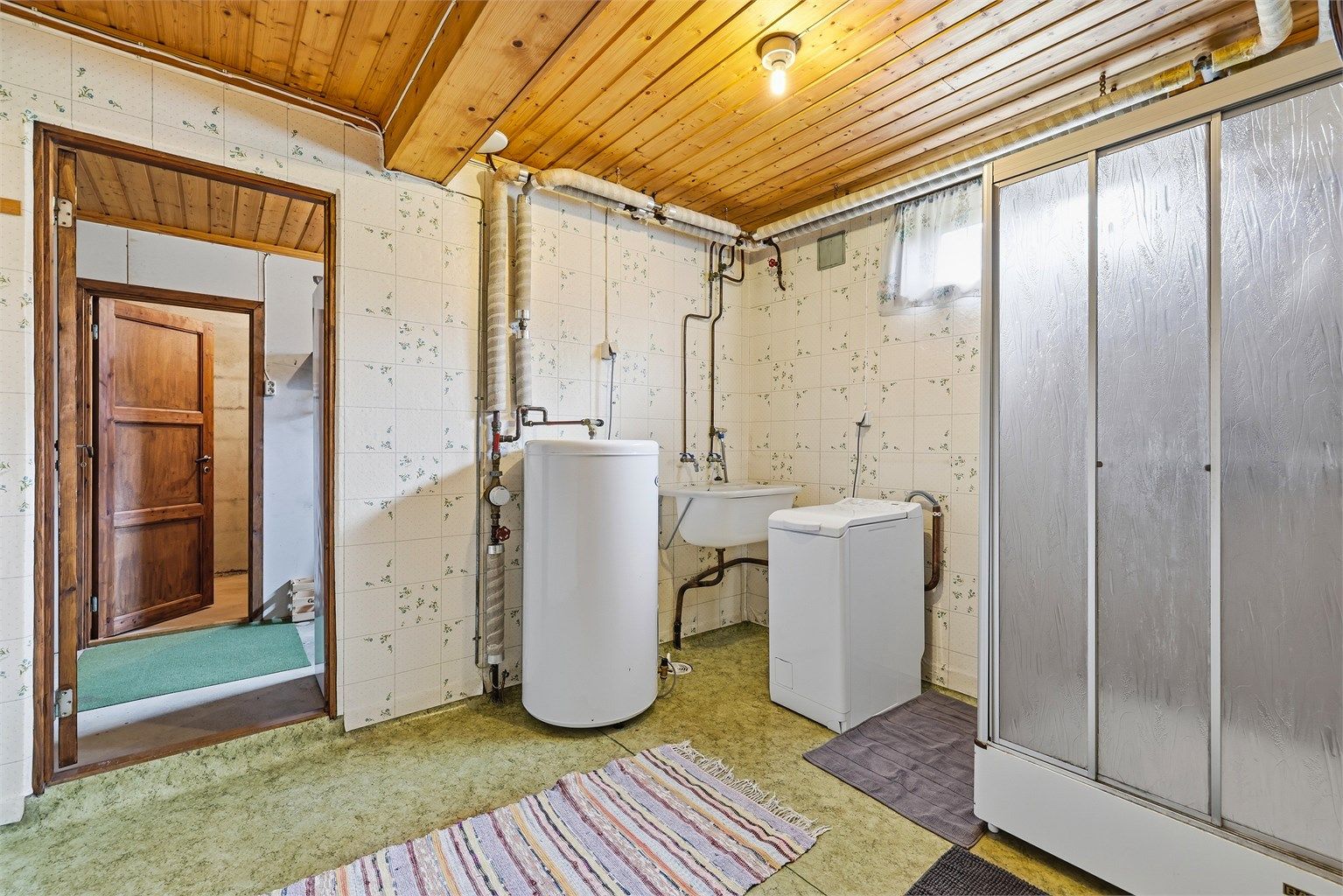 Vaskerom i boligens underetasje.