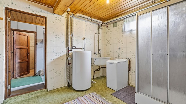 Vaskerom i boligens underetasje.