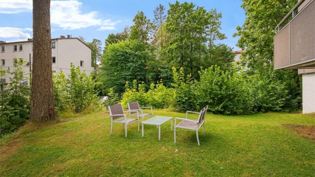Store, grønne fellesarealer rett utenfor døren.