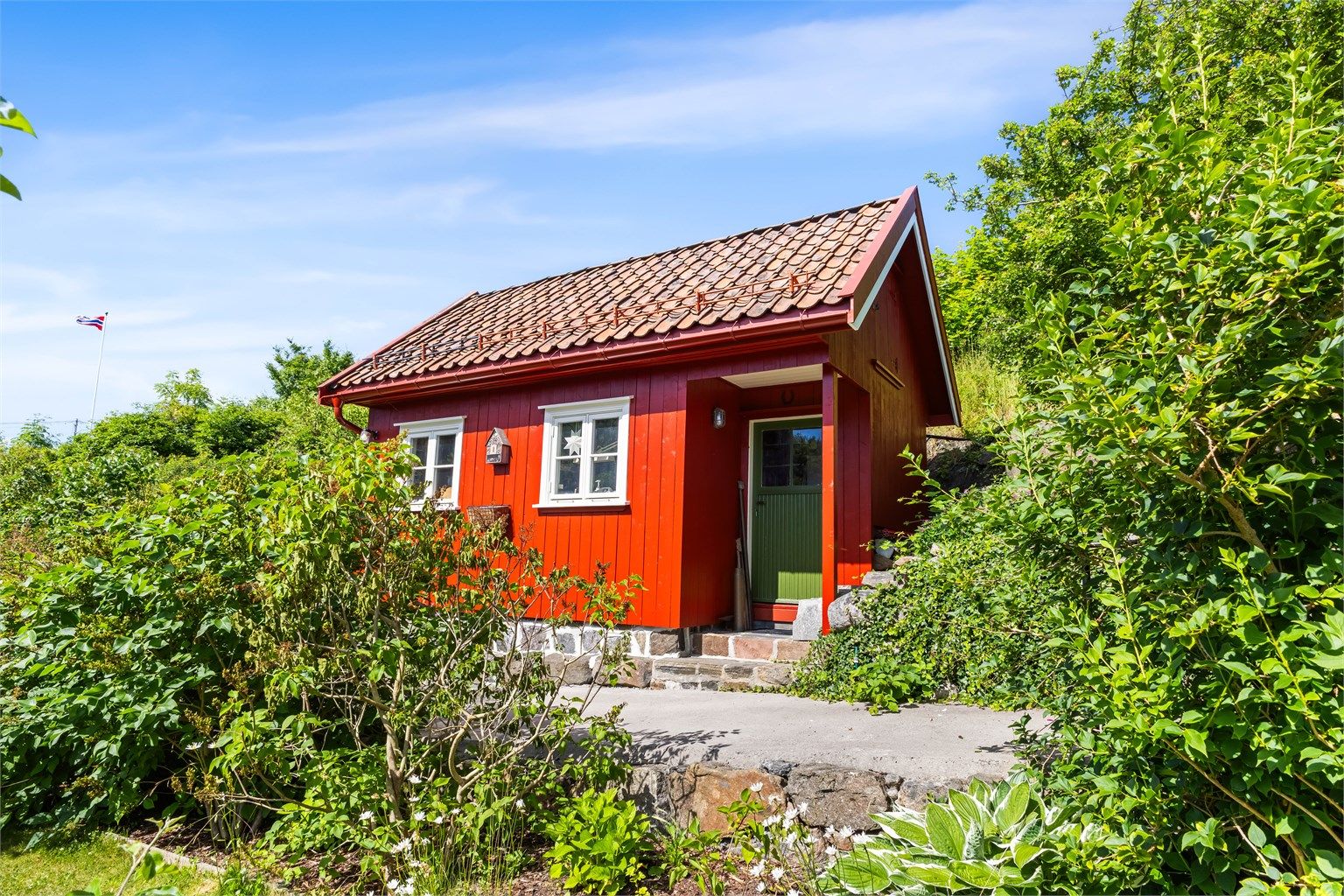 Frittstående uthus på 15 m², oppført i 2015.