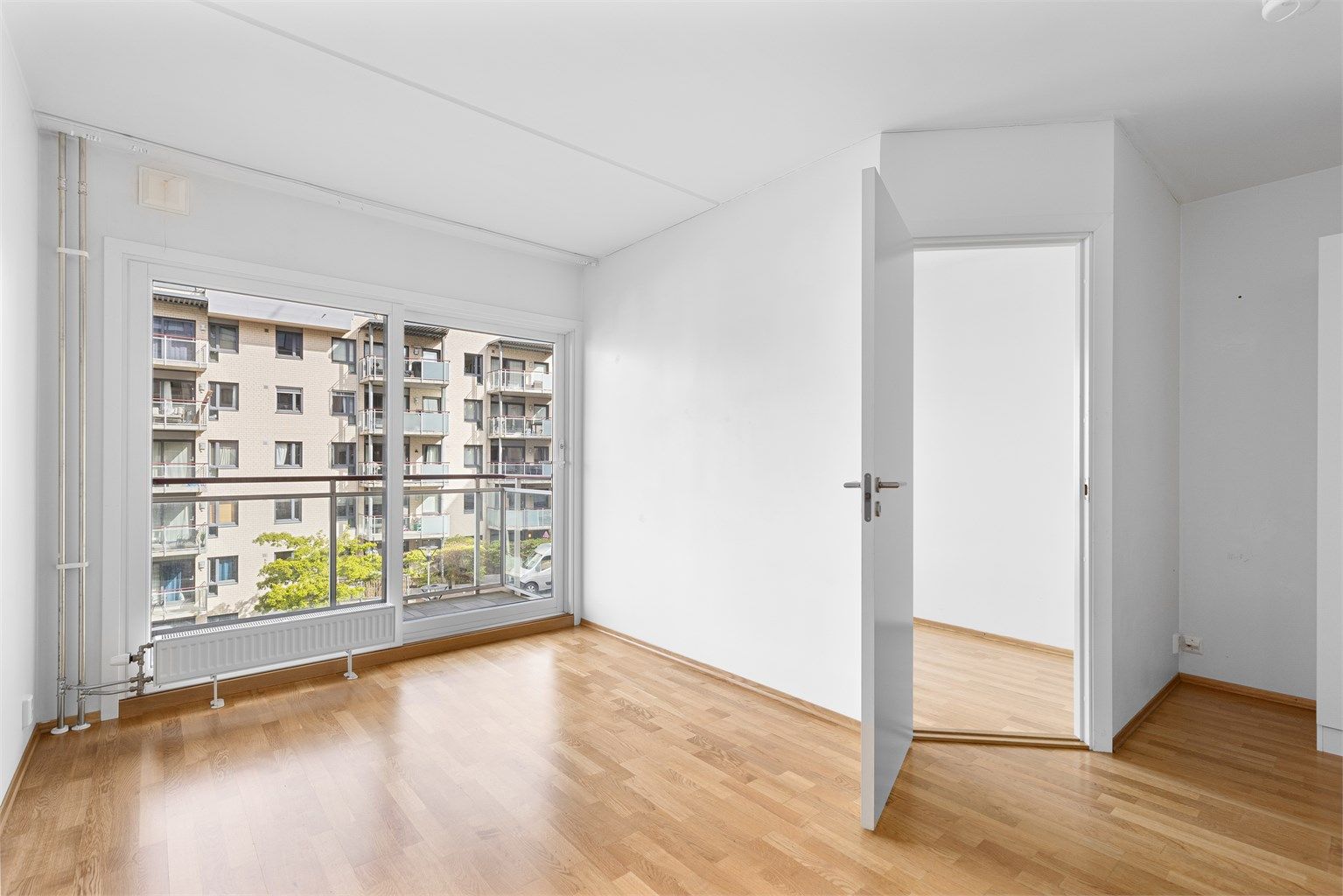 Velkommen til Nydalen Allé 27, en arealsmart leilighet med åpen stue-kjøkkenløsning 