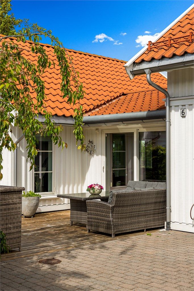 FAVORITTPLASS med terrassemarkise i en lun del av terrassen.