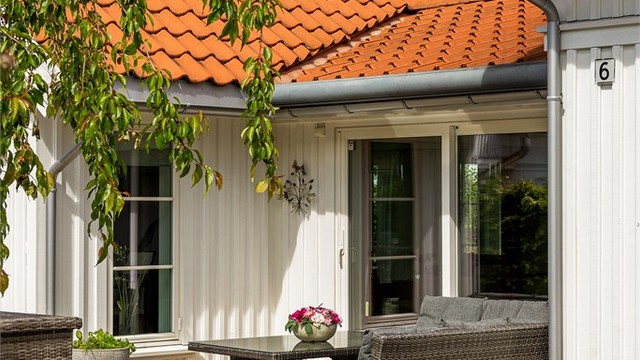 FAVORITTPLASS med terrassemarkise i en lun del av terrassen.