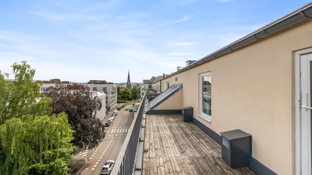 Her har du tilgang til en herlig felles takterrasse med fin utsikt over