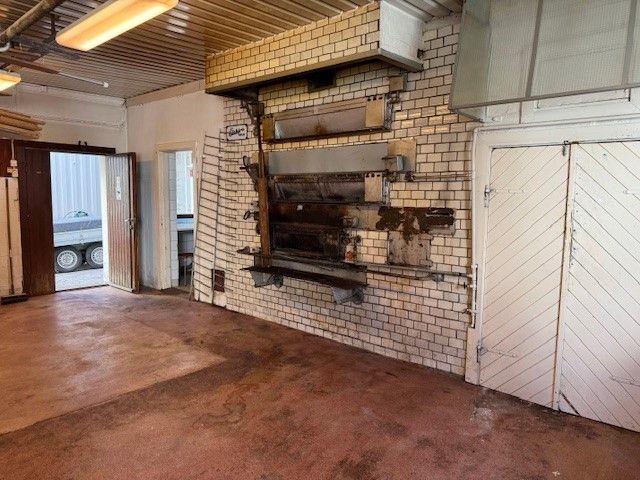 Den gamle bakerovnen hvor en baker direkte på stein.