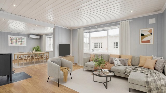 Store vindusflater som gir godt lysinnslipp og en luftig romfølelse | Varmepumpe og peis som sikrer et godt inneklima og en lun atmosfære