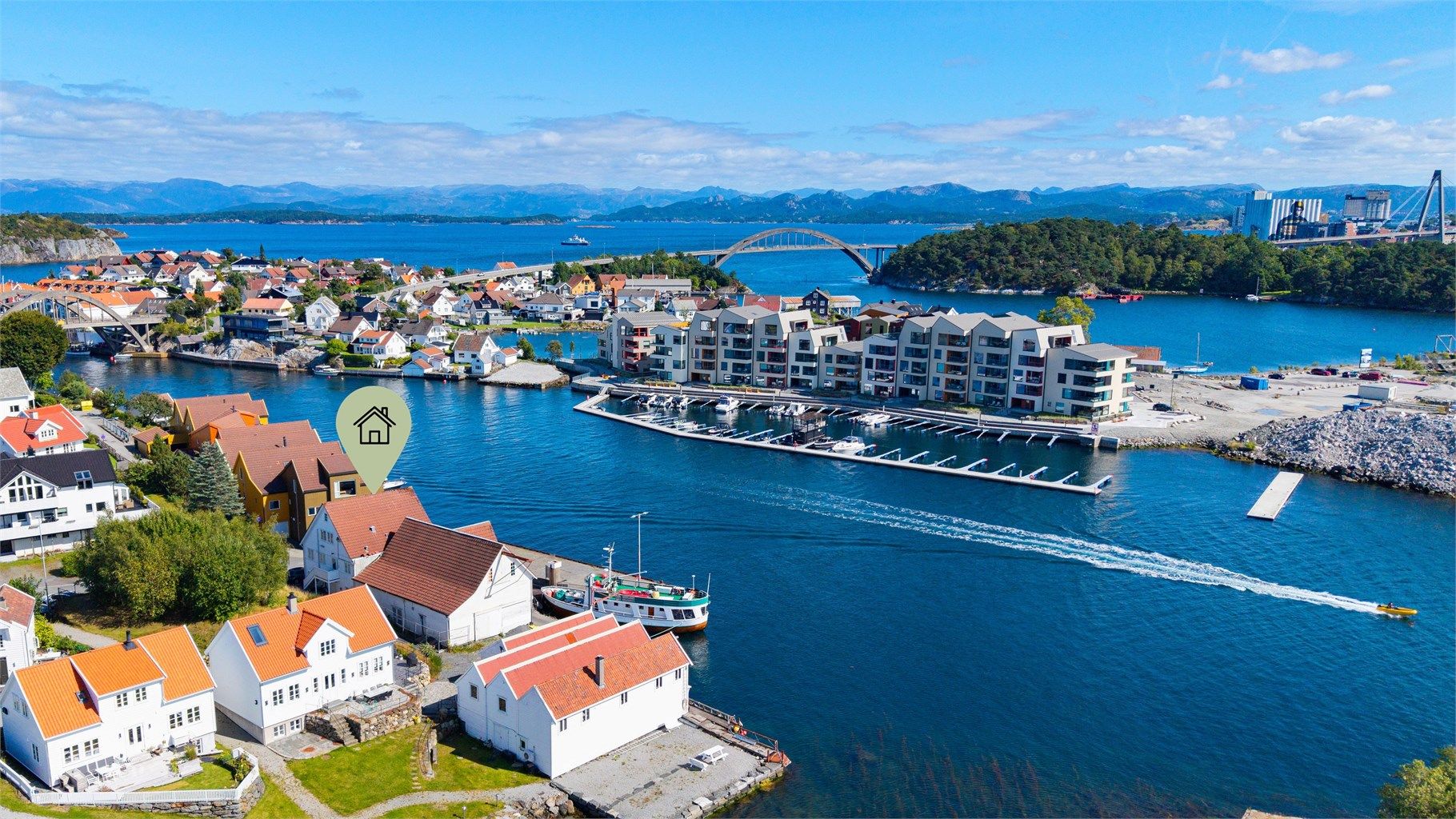 Her kan du nyte flotte sommerdager med yrende båtliv. Foto av Marianne Lyse. 