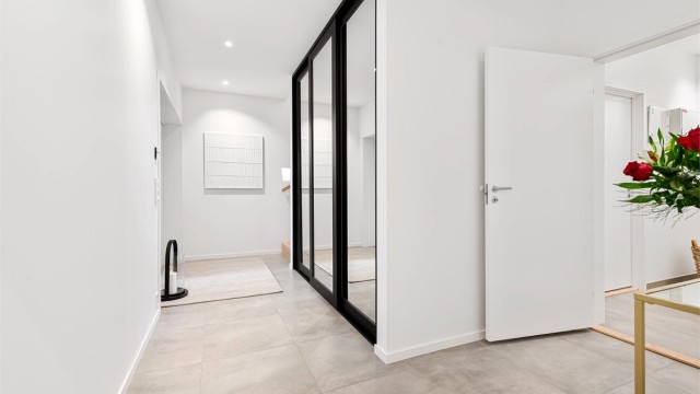 Flislagt hall/gang trapperom i underetasjen