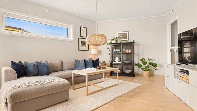 En lekker stue med som enkelt deles inn i flere soner, samtidig som den gir rom for kreative innrednings- løsninger.