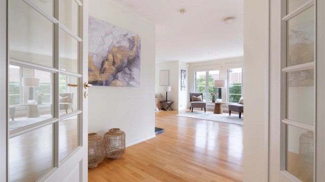 Entréen fungerer som et bindeledd mellom leilighetens rom.