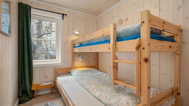 Praktisk soverom med køyeseng – ideelt for barn eller gjester, med effektiv utnyttelse av plassen.