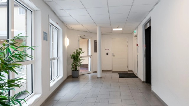 Felles inngangsparti med heisadkomst direkte opp til leilighetsplan.