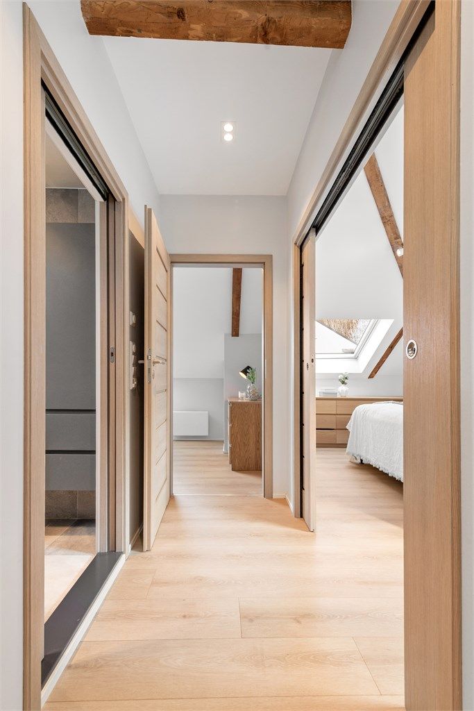 Gang fra kjøkkenet binder soverommene og badet sammen med resten av leiligheten.
