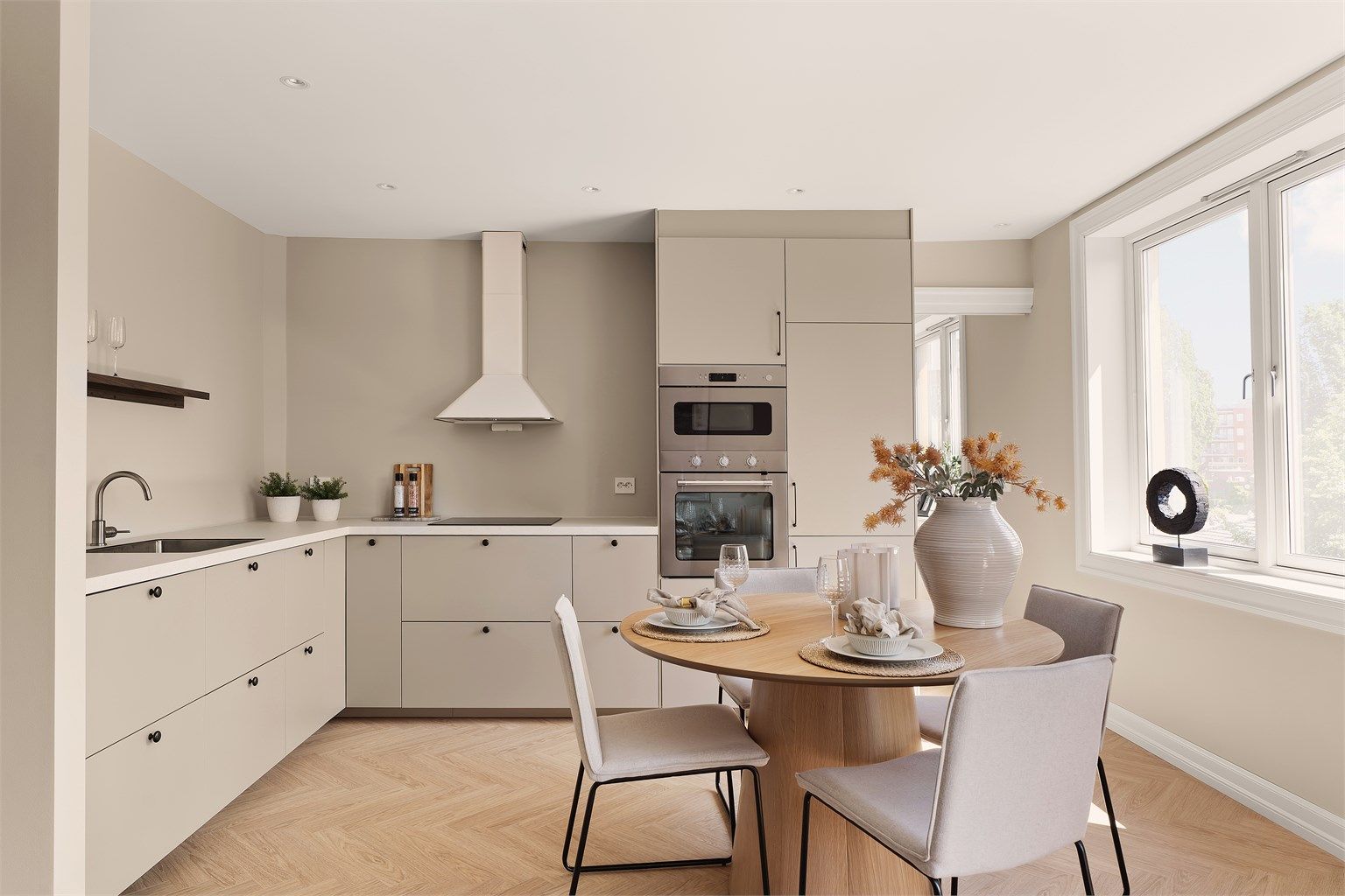 Lekkert påkostet kjøkken med integrerte hvitevarer. 