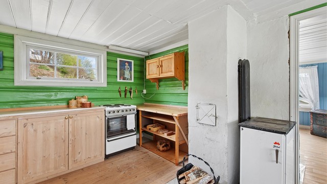 Den gamle delen av hovedhuset var opprinnelig en husmannsplass fra slutten av 1800-tallet.