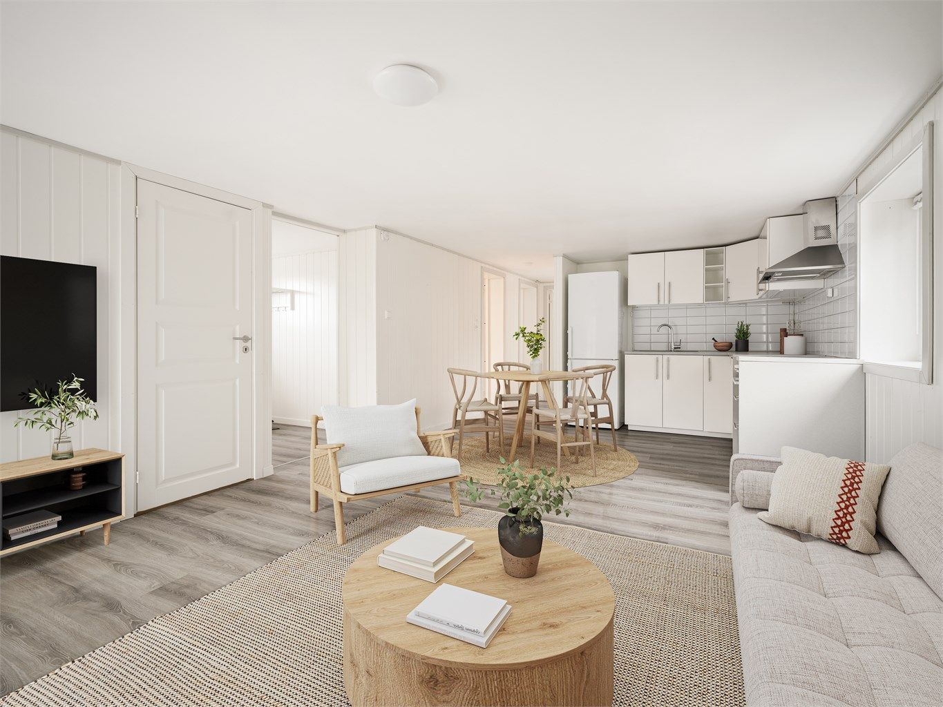 Sekundærboligens areal er effektivt disponert, blant annet med stue og kjøkken i åpen løsning. Bildet er digitalt møblert.