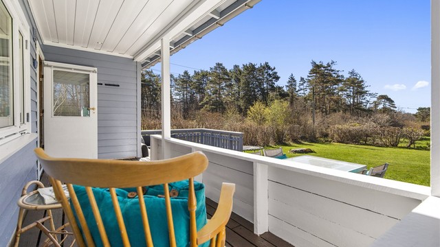 En lun krok på den overbygde terrassen. Ypperlig for litt skygge på varme dager.