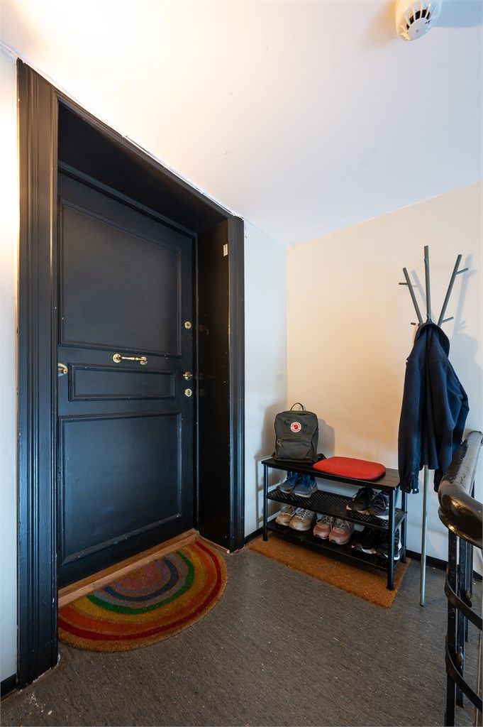 Hyggelig inngangsparti i felles oppgang.