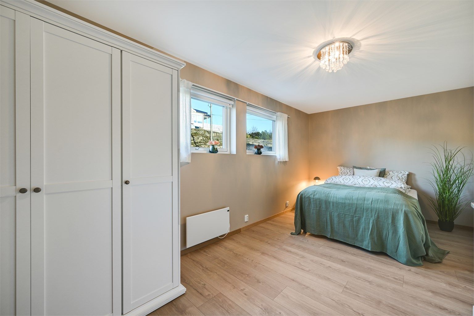 Lunt og hyggelig soverom.