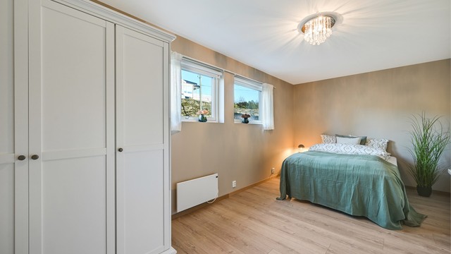 Lunt og hyggelig soverom.