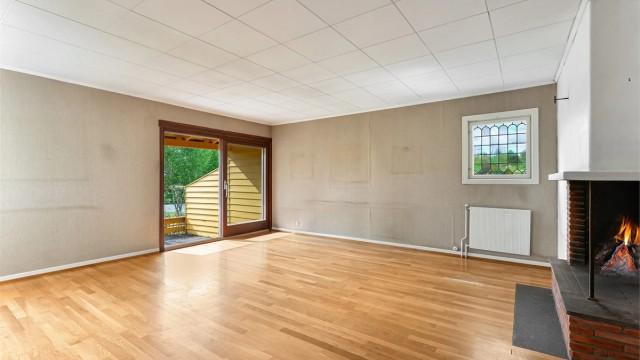 Fra hovedstaden er det utgang til terrasse og hage