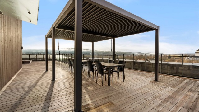 Pergola og fine uteområder på takterrassen