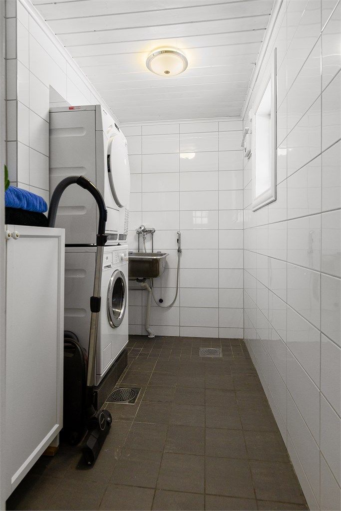 Praktisk vaskerom med utgang direkte ut