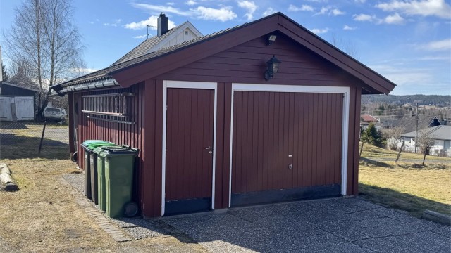 Frittstående garasje på 23 m² med mulighet for montering av ladeboks.