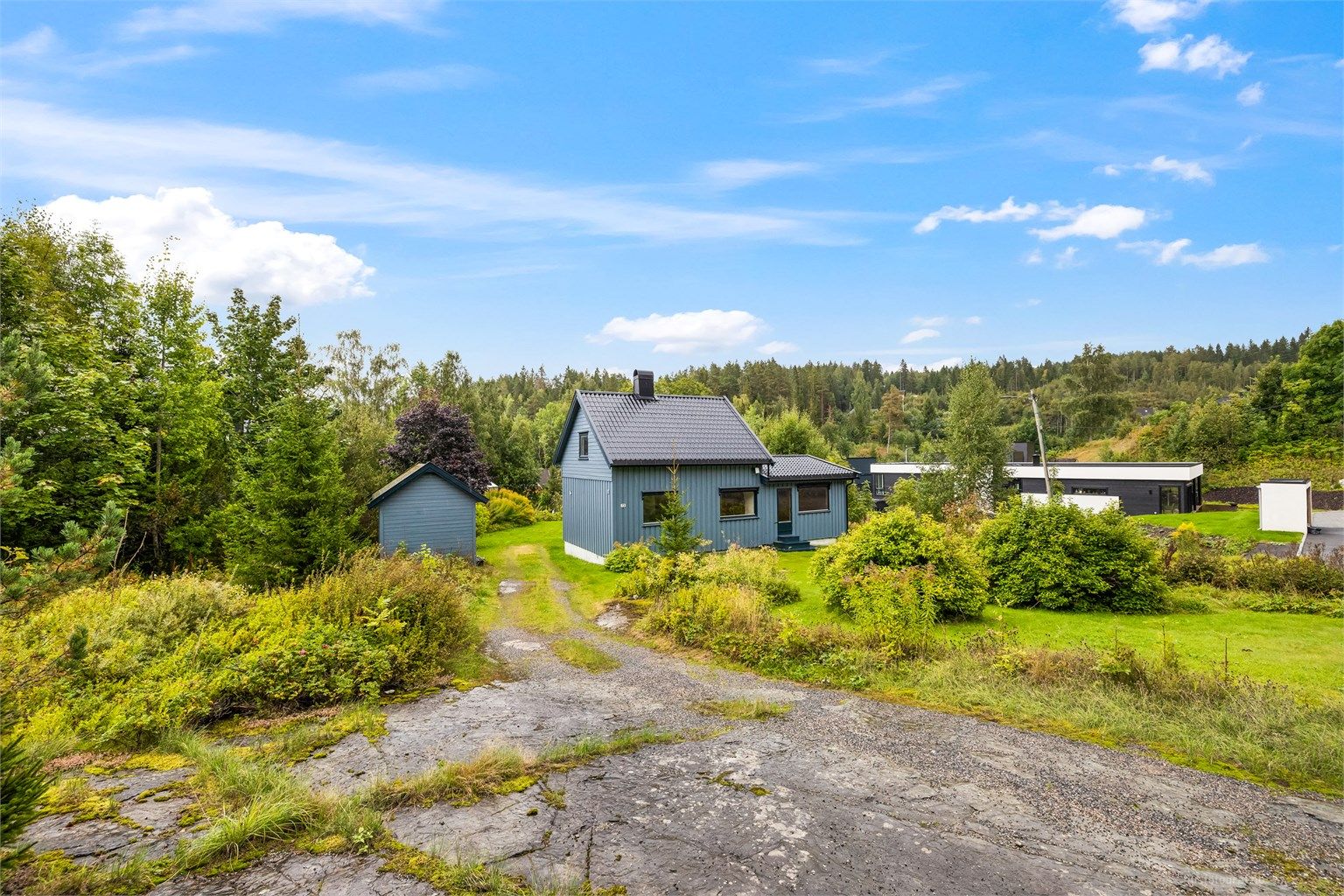 Enebolig med 2 etasjer og kjeller