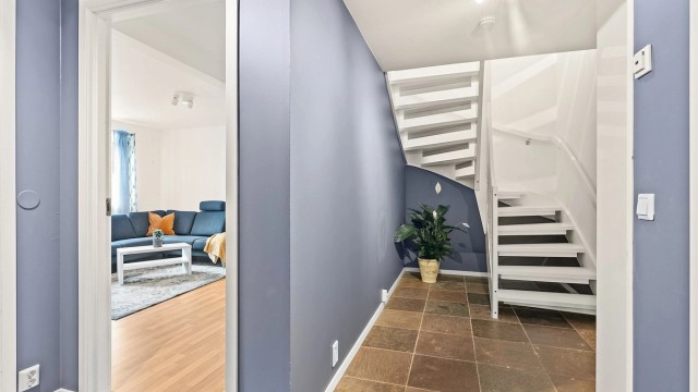 Flislagt gang med elektrisk gulvvarme.