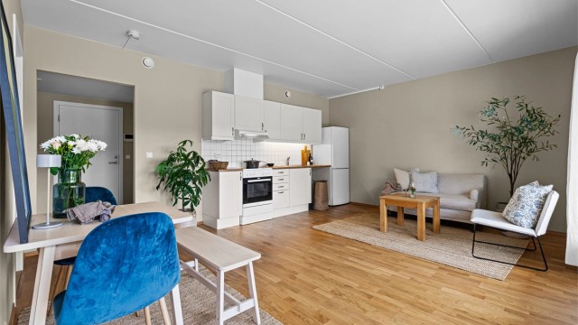 Åpen kjøkkenløsning mot stue - moderne leilighet fra 2013