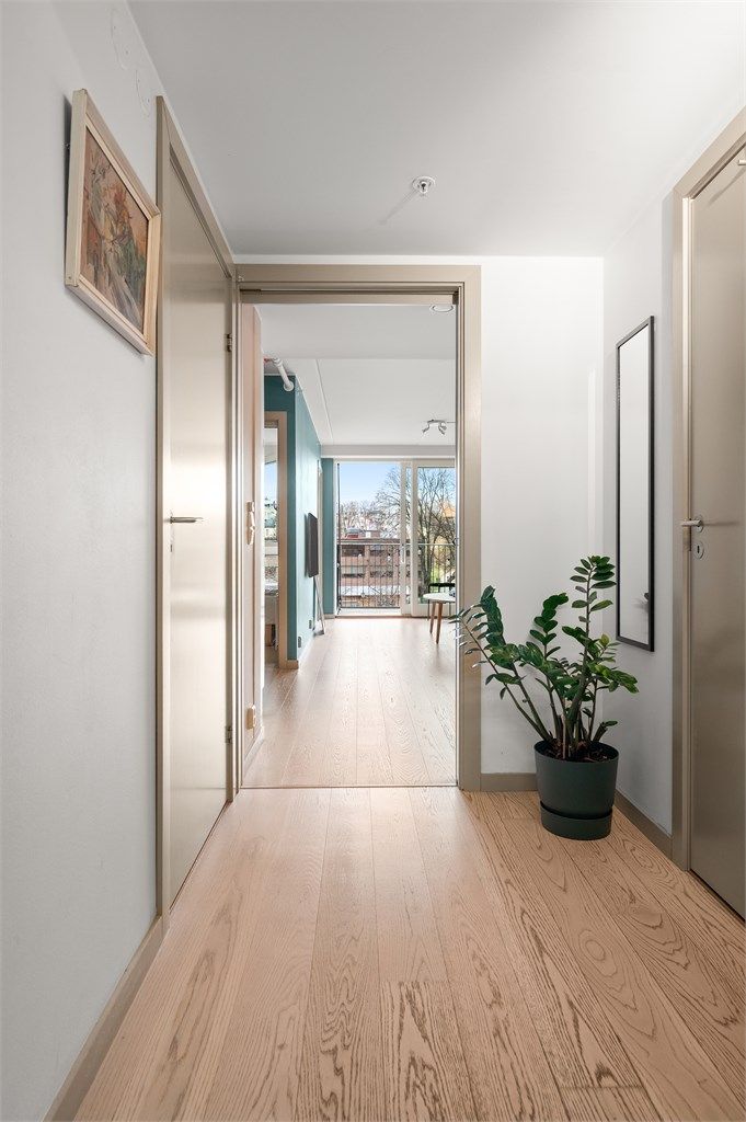 Her får du en innbydende entré som gir et godt førsteinntrykk av leiligheten. 