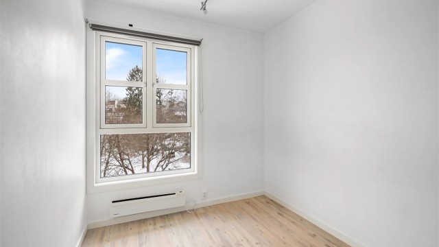 Soverommene er samlet i en egen del av leiligheten.