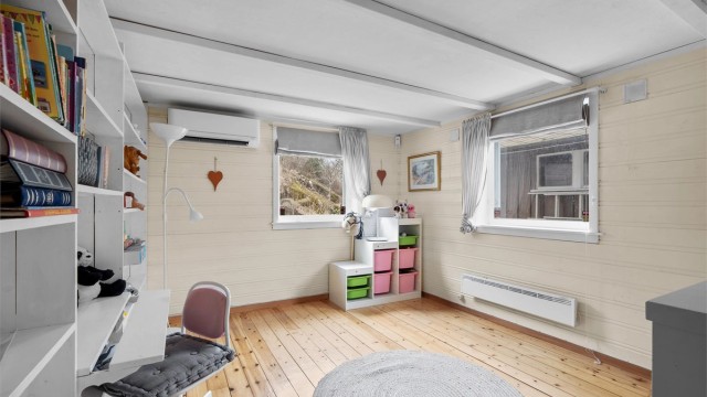 Kjellerstue - kjellerstue som egner seg perfekt til hjemmekino, lek, hobby eller avslapning med plass til både sitte- og oppbevaringsløsninger