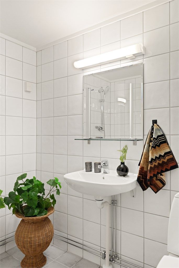 Badet har varmekabler og opplegg for vaskemaskin