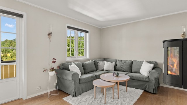 Peisovnen med glassdør gir ekstra varme og hygge på kalde dager.