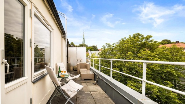 Aksjelaget har en hyggelig felles takterrasse til disposisjon for beboere.