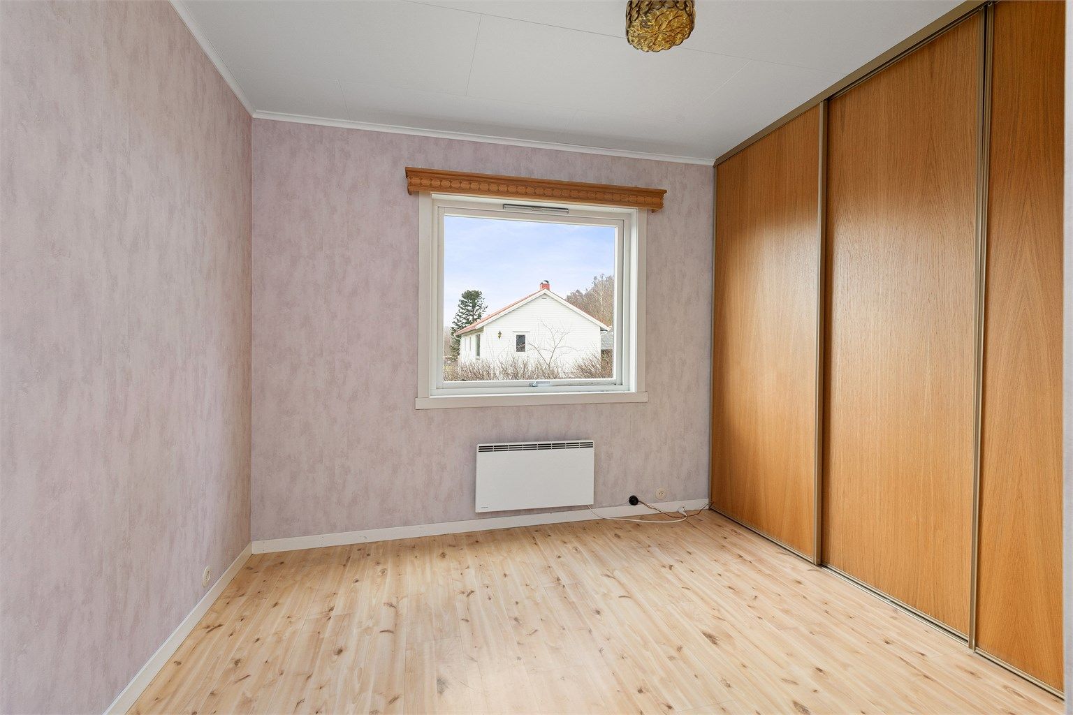 Soverom i leiligheten i første etasje