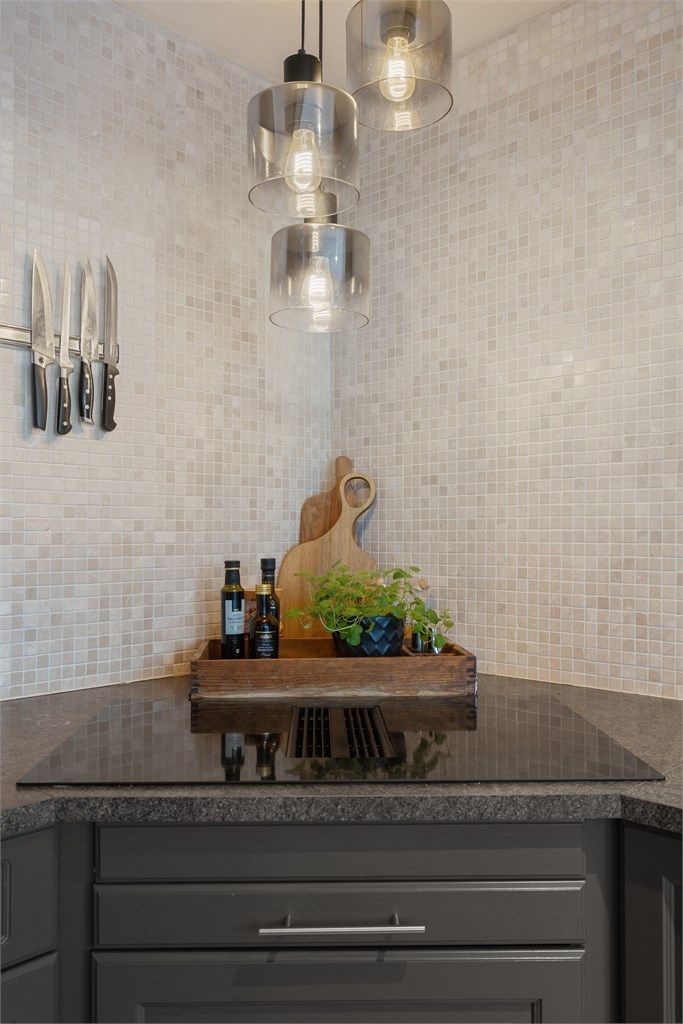 Platetopp med integrert avtrekk