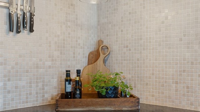 Platetopp med integrert avtrekk