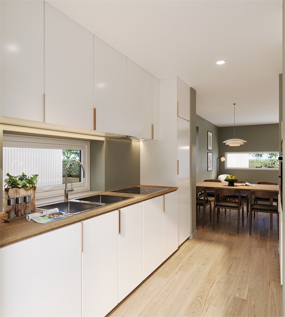 Stilfull kjøkkeninnredning fra Aubo med integrerte hvitevarer.