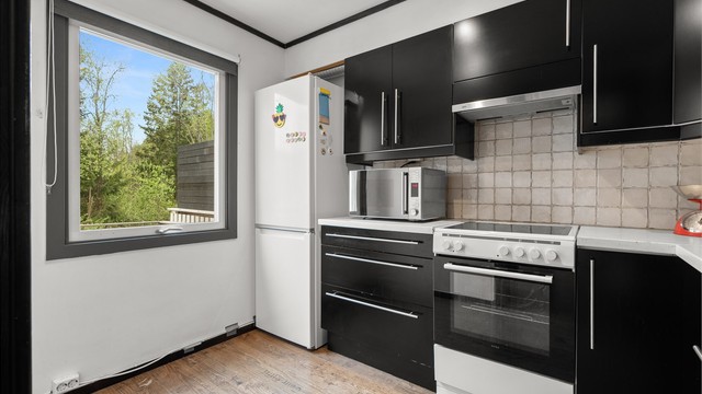 Kjøkken - utsikt til marka når man lager en bedre middag eller en enkel frokost