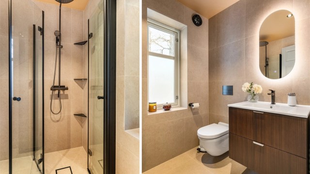 Boligens to bad er renovert så nylig som i 2026. Storformat fliser er lagt vinkelrett på gulv og vegger, listefritt mot både vinduskarmer og himlinger.