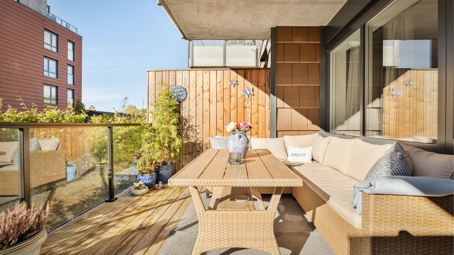 Terrassen er lun og har en direkte tilknytning til felles atrium.