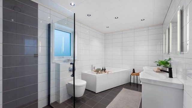 Her har du det meste du trenger for velvære med både dusj, badekar og dobbel servant. Her er også god belysning fra spotter i taket